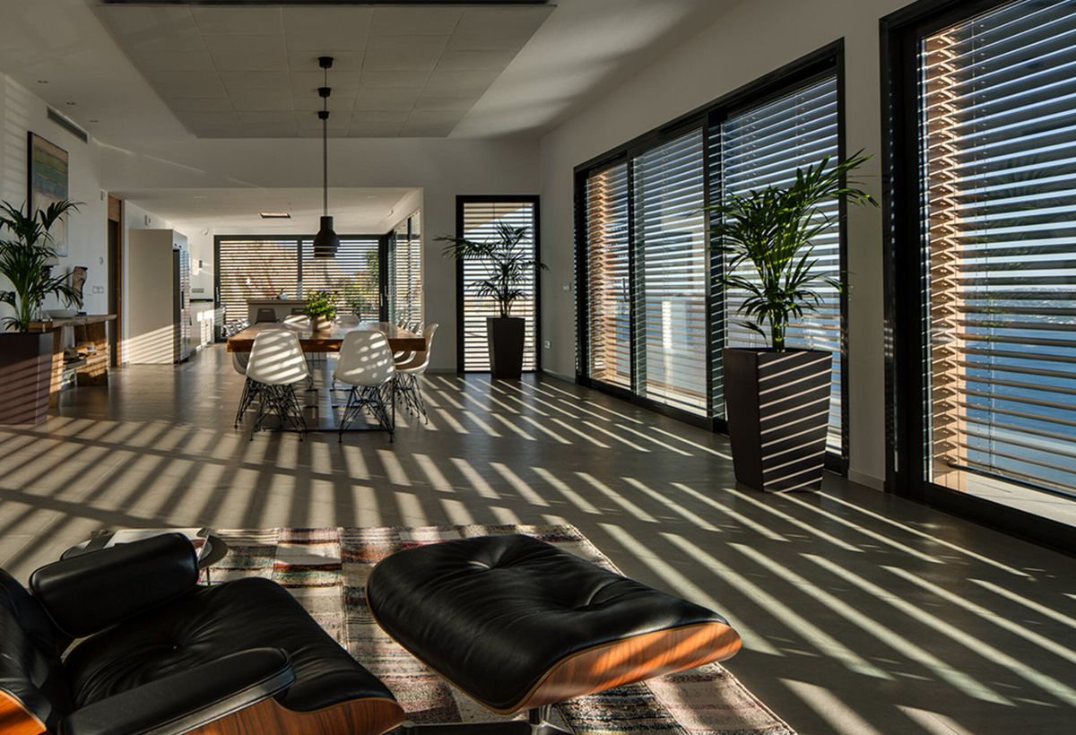 Cellular honeycomb blinds on Melbourne home window providing thermal insulation — energy efficient internal blinds